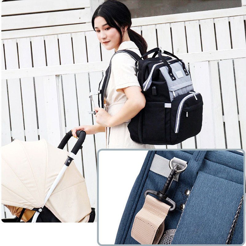 Multifunctional Maternity Diaper Backpack with Foldable Baby Crib & Mosquito Net